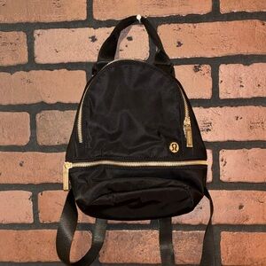 lululemon athletica Black Mini Bag with Gold Accents